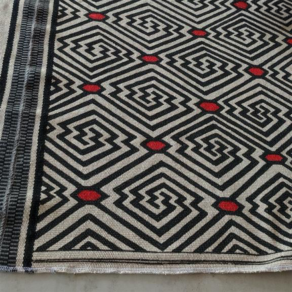 tela estampada a mano con motivos geométricos